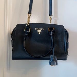 **SOLD**PRADA black 100% authentic purse with short handles and one long handle!
